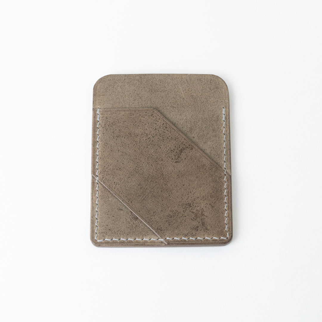 3-taskuinen korttikotelo